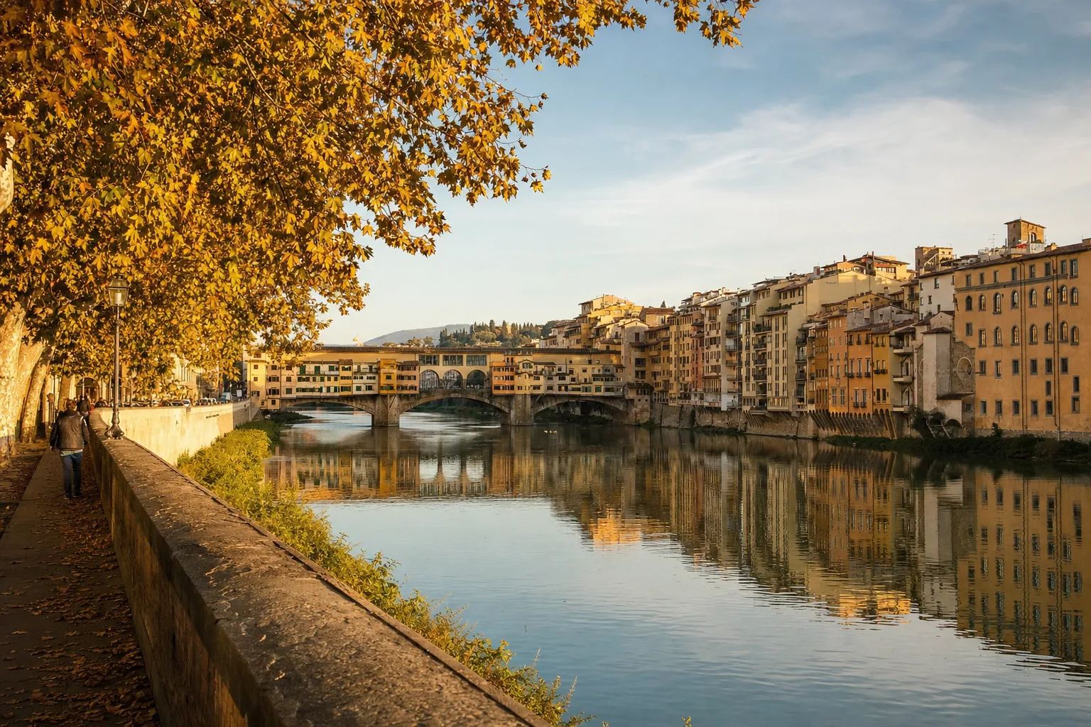 AI-generated image: Arno River, Florence: A serene view of the Arno River lined with historic buildings, showcasing the warm hues of autumn foliage. The soft afternoon light casts a golden glow on the
